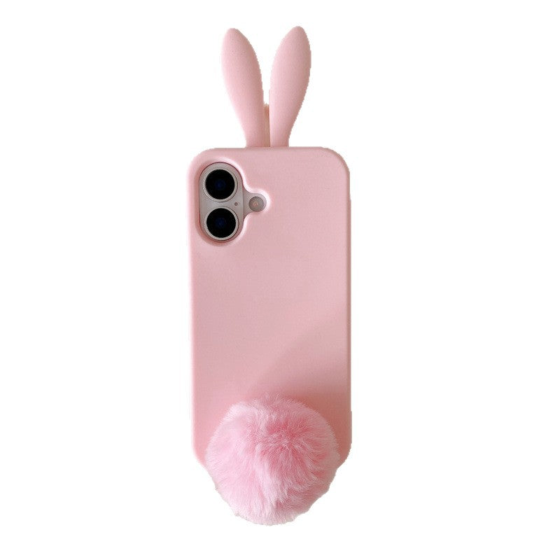 Light pink silicone rabbit iPhone case with ears and pom pom tail on a plain background