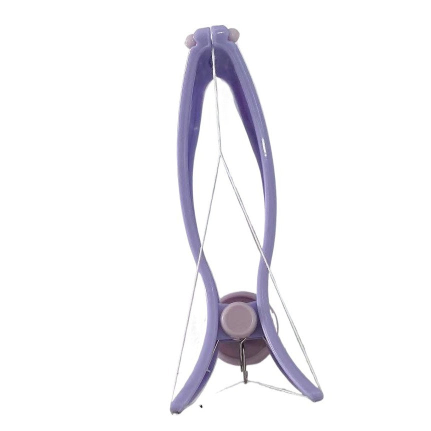 Manual cotton thread facial hair remover shown with its small round storage holder