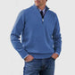 Blue mens acrylic knit quarter zip stand collar pullover sweater worn by a standing male model