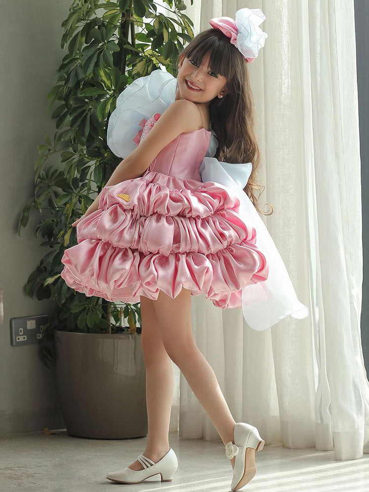 Girls' princess bow dress worn for a party occasion