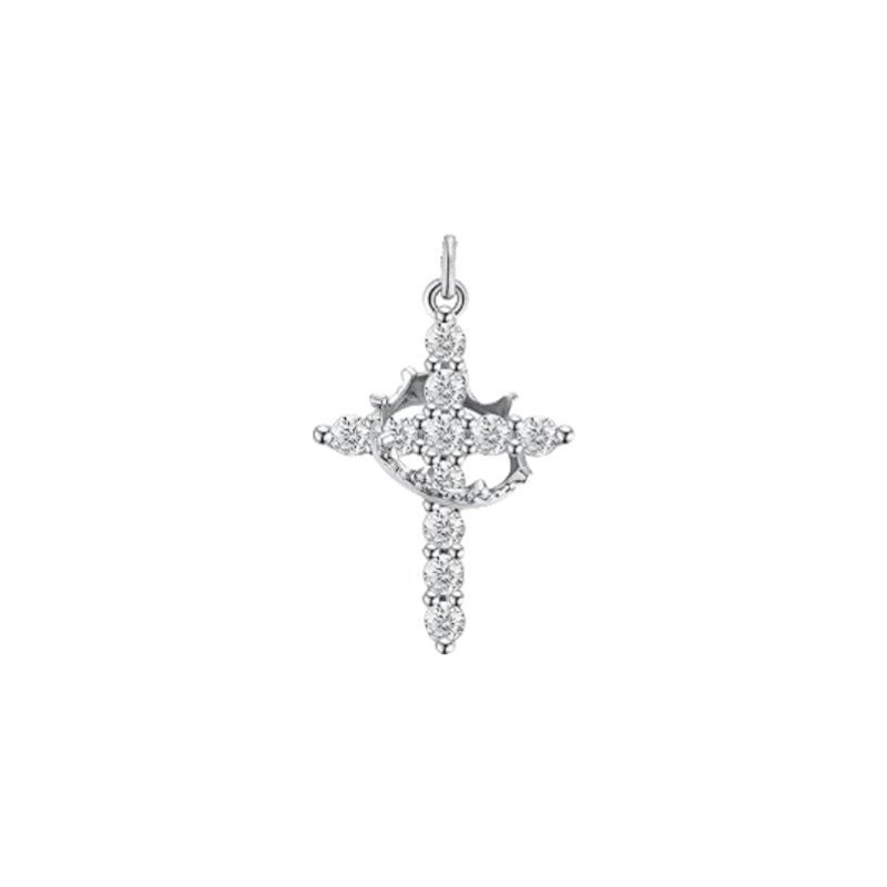 Scale reference close up of the small cross pendant and chain