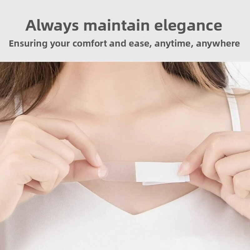 Clear fashion tape strip pressed along a V-neckline to hold the fabric flat against the skin