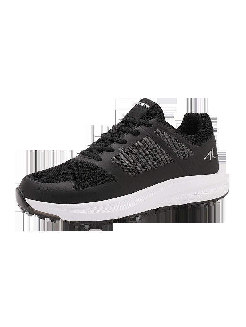 Mens golf shoe shown from the heel with a cushioned low top collar