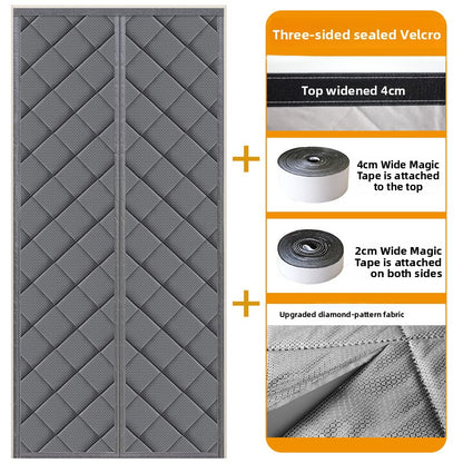 gray quilted thermal door curtain hung over a doorway with a center walk through split