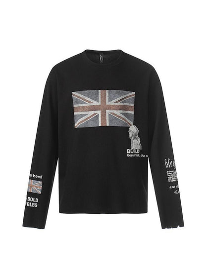 Black long sleeve t-shirt with a Union Jack print, a small figure and lettering, front view
