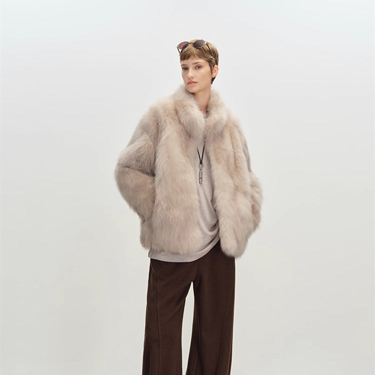 Pale grey cream faux fur coat on a model, long pile and dropped shoulder line