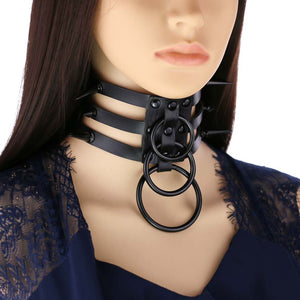 Black studded gothic choker with O-ring drop shown on a mannequin at a three quarter angle