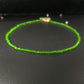 Gold tone lobster clasp and extension chain at the back of the bead necklace
