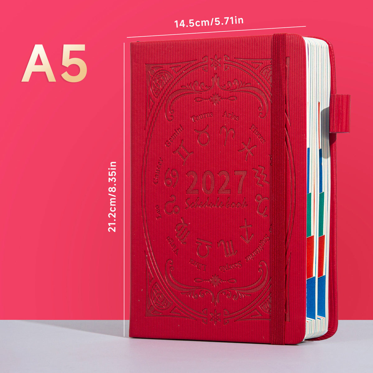 Red A5 zodiac embossed planner notebook standing with elastic band and colored page edges