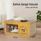 Extra large cardboard cat scratcher house 60 by 30 by 30 centimetres with a cat resting on top