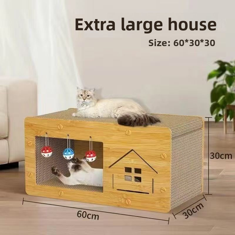 Extra large cardboard cat scratcher house 60 by 30 by 30 centimetres with a cat resting on top