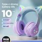 Purple gradient cat ear headphones on a plinth showing the padded ear cushions