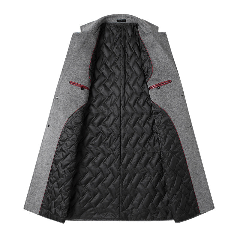 Gray long coat opened flat showing the black quilted lining with red piping and red-trimmed inner pockets