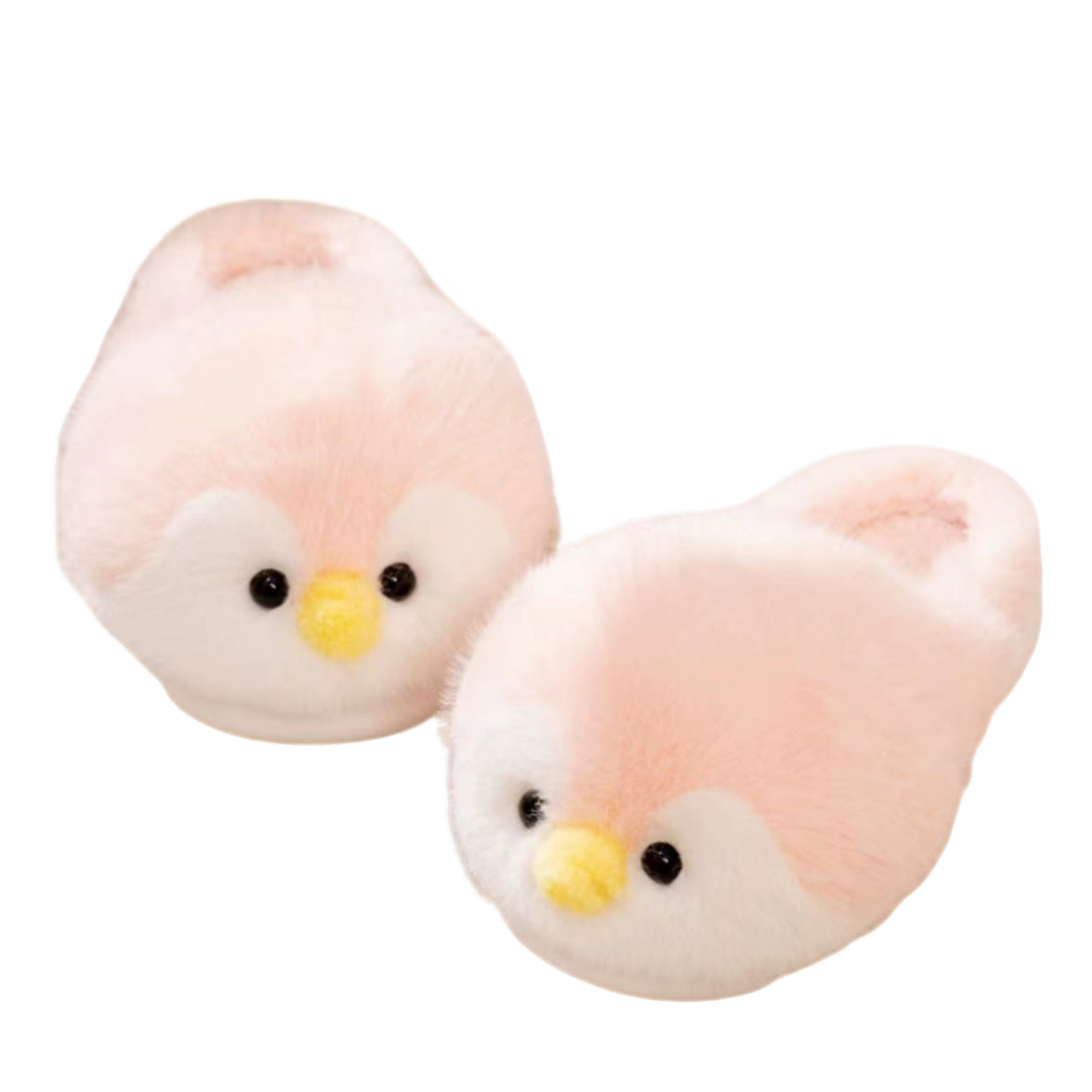 Pair of pink plush penguin slippers with yellow beaks and black eyes on a white background