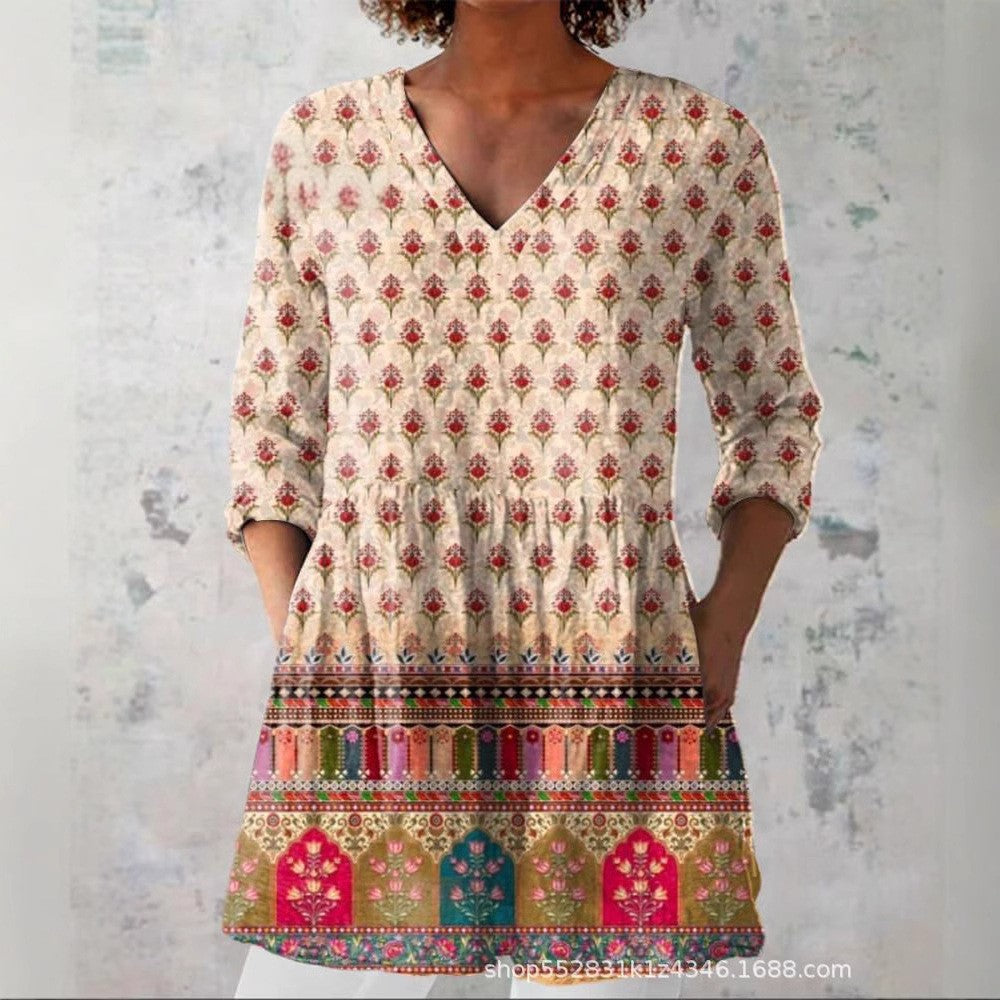 Loose printed tunic with three quarter sleeves with the peplum skimming the waist and hip