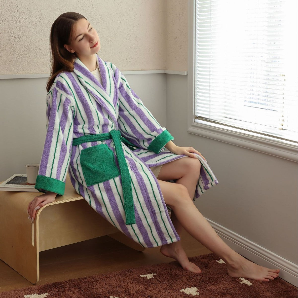 Striped hooded combed cotton terry bathrobe shown full length with contrast cuffs and waist tie belt