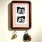 Option A4 Hook Style 4: dark wood wall photo frame with fine pink striped backing and two key hooks