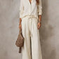 White shirt and pleated wide leg pants set, size M, braided tie belt at the waist