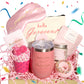 Self care gift box laid out with a scented candle, soap, bath salts and a printed card