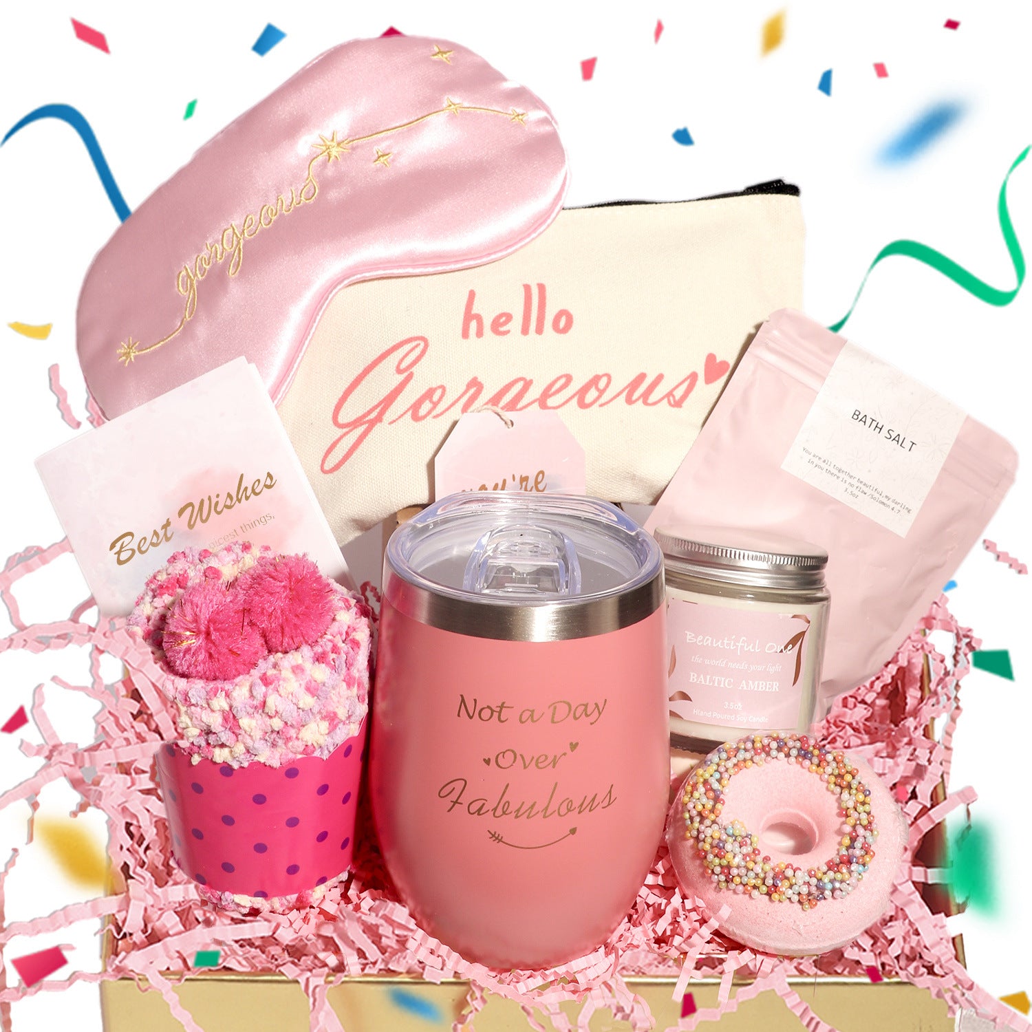 Self care gift box laid out with a scented candle, soap, bath salts and a printed card