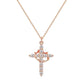 Zircon cross pendant necklace worn against an open neckline