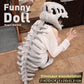 Gray plush dinosaur exoskeleton costume hood and long spine tail draped over a person kneeling on tiles