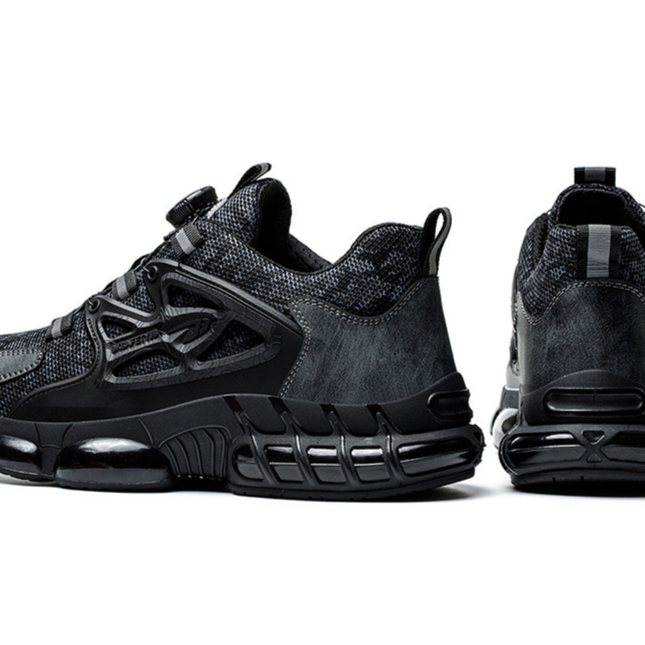 Pair of black steel toe work sneakers seen from the back