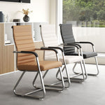Three ribbed cantilever conference chairs in tan, ivory and black leather with fixed armrests in a bright office