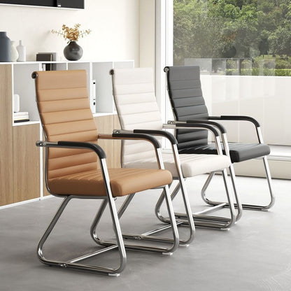 Three ribbed cantilever conference chairs in tan, ivory and black leather with fixed armrests in a bright office