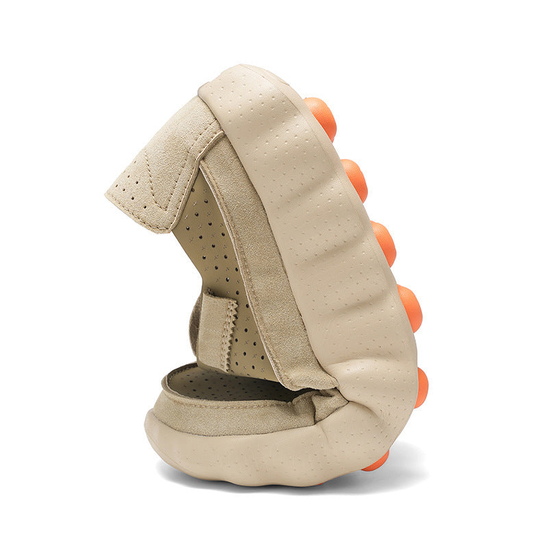 Slip on sneaker with elastic gore panel and heel pull tab