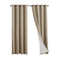 Linen look polyester blackout grommet curtain panel with white thermal backing pleated on a slim black rod over a tall window