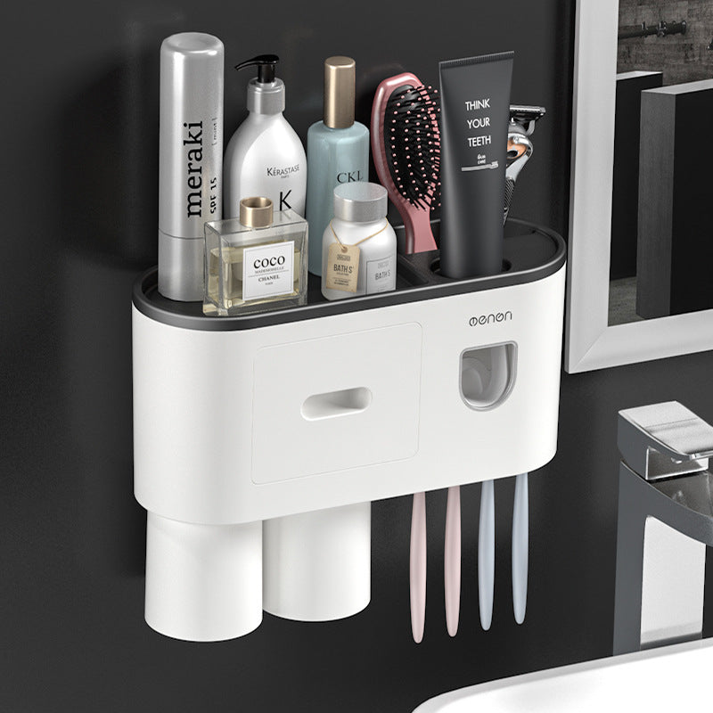 Wall mounted organizer with a drawer, two rinse cups and toothbrush slots