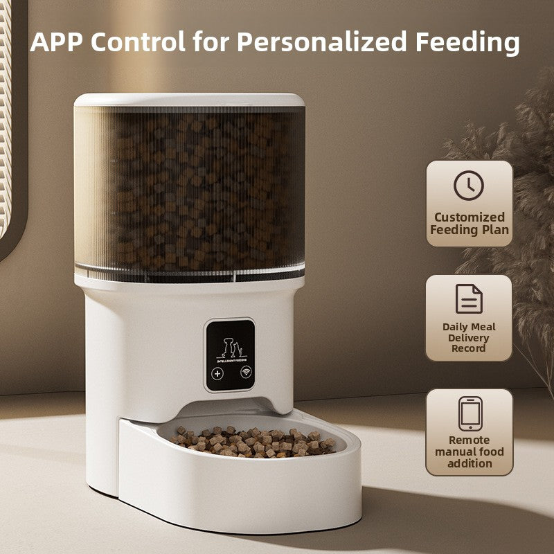 White pet feeder dispensing kibble into the moulded feeding tray