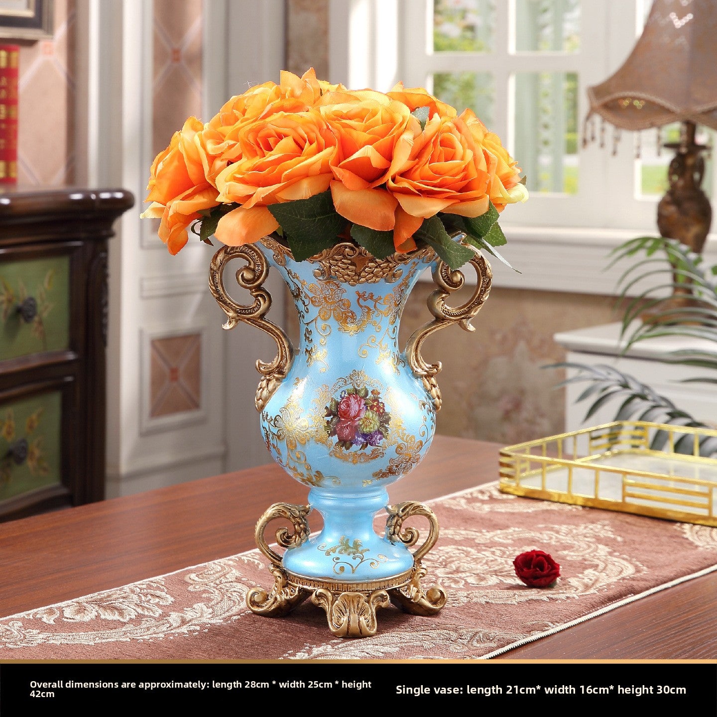 European style resin display piece with pearl shell inlay and gilt scrollwork on a tabletop scene