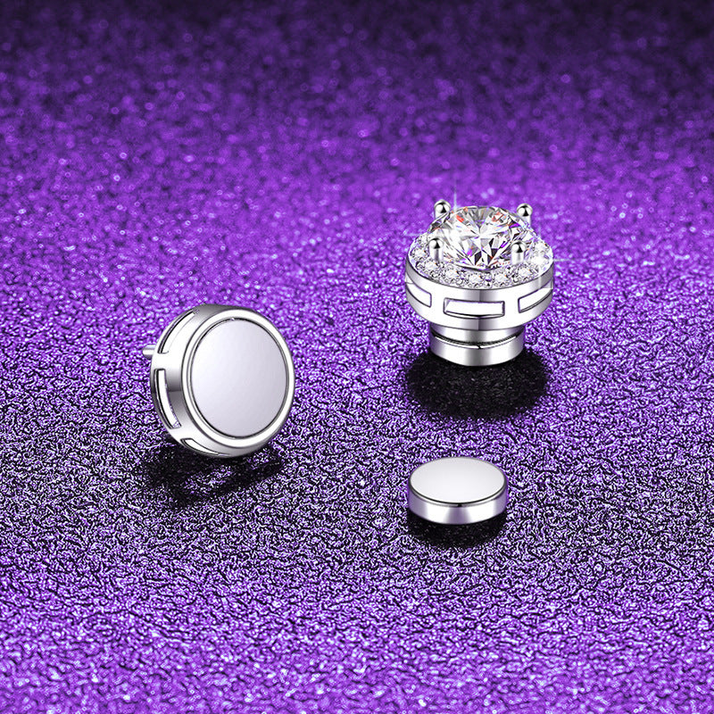 Magnetic stud earring shown in two parts, the stone set front and the plain flat magnet back beside it