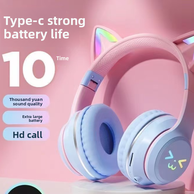Pink and blue gradient cat ear headphones with the ear tips lit in rainbow colours