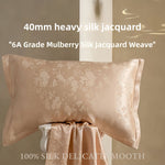 Peach jacquard silk pillowcase with floral branches on a column, silk fabric draped below it