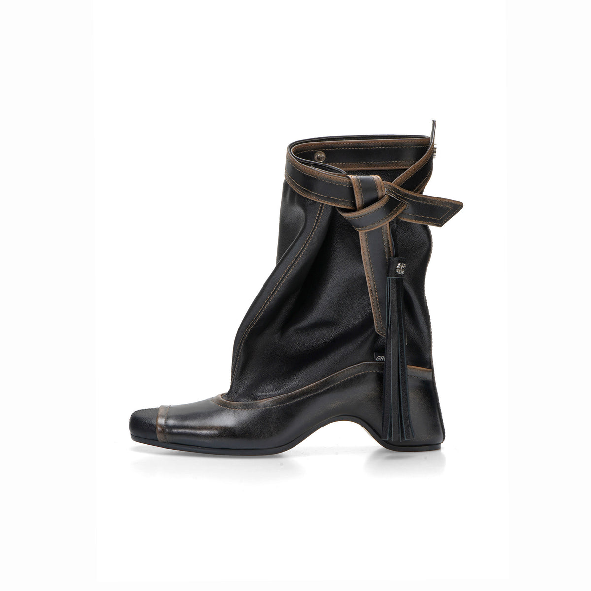 Three brown and black foldable boots lined up to show the color range and shaft height