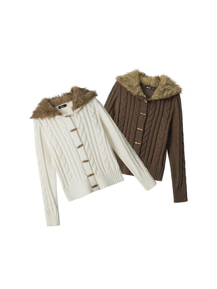 Cream white and coffee brown cable knit cardigans with fur trimmed hoods and wooden toggles laid side by side