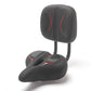 Side view of cushioned scooter saddle and backrest showing central relief channel