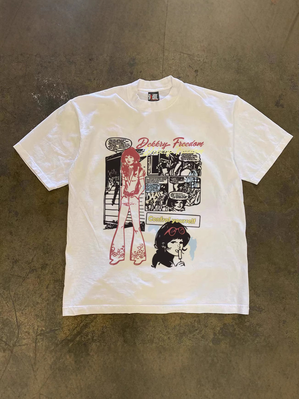 Detail of the Y2K comic front print on the white oversized heavyweight cotton tee