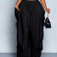 High waist wide leg linen look viscose drawstring trousers, the ruched side ties gathering the outer leg