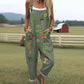Printed button strap overall jumpsuit with a loose fit and tapered roll up legs