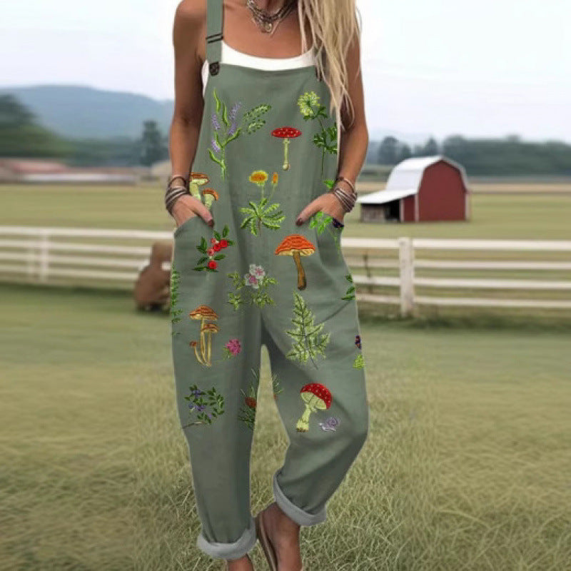 Printed button strap overall jumpsuit with a loose fit and tapered roll up legs