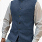 Blue herringbone stand collar vest over a white shirt, size S