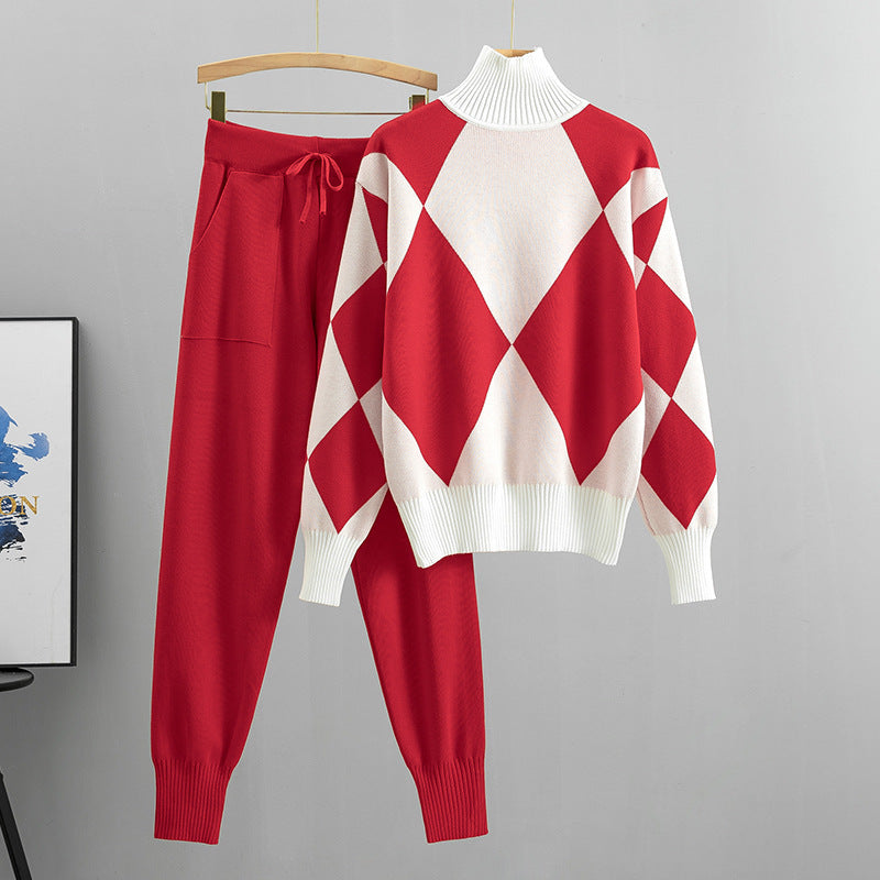 Red argyle knit sweater and jogger pants set with white panels on a hanger, size L option