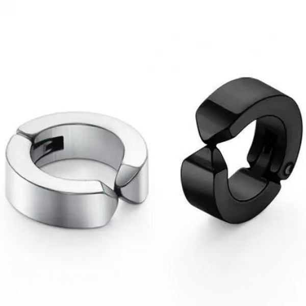 Polished steel clip on ear cuff beside a black clip on ear cuff, both wide C shaped rings with a hinge