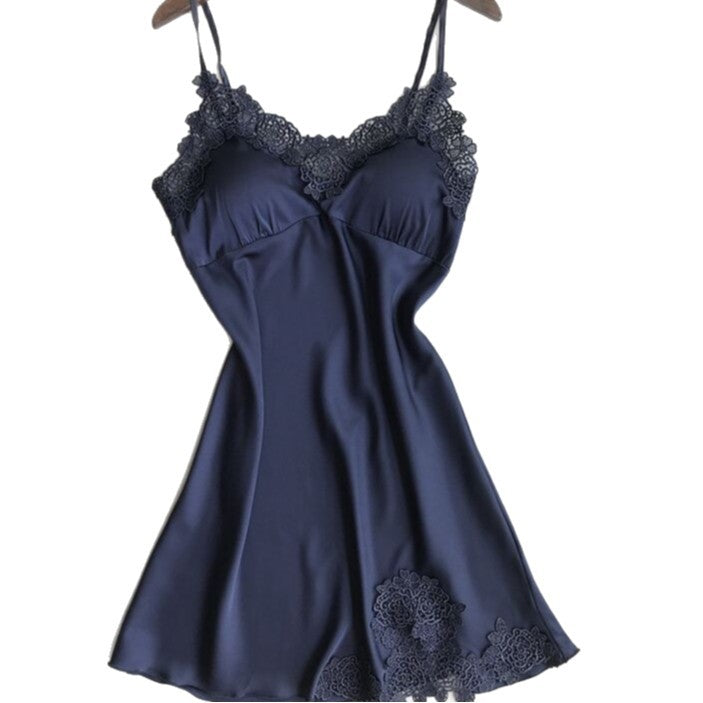 Ice silk lace cami nightgown in navy blue on a hanger with removable triangle bust pads beside it, angled view
