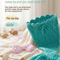 Teal crochet mermaid tail with drawstring waist and pink tie back top on a cream knit throw