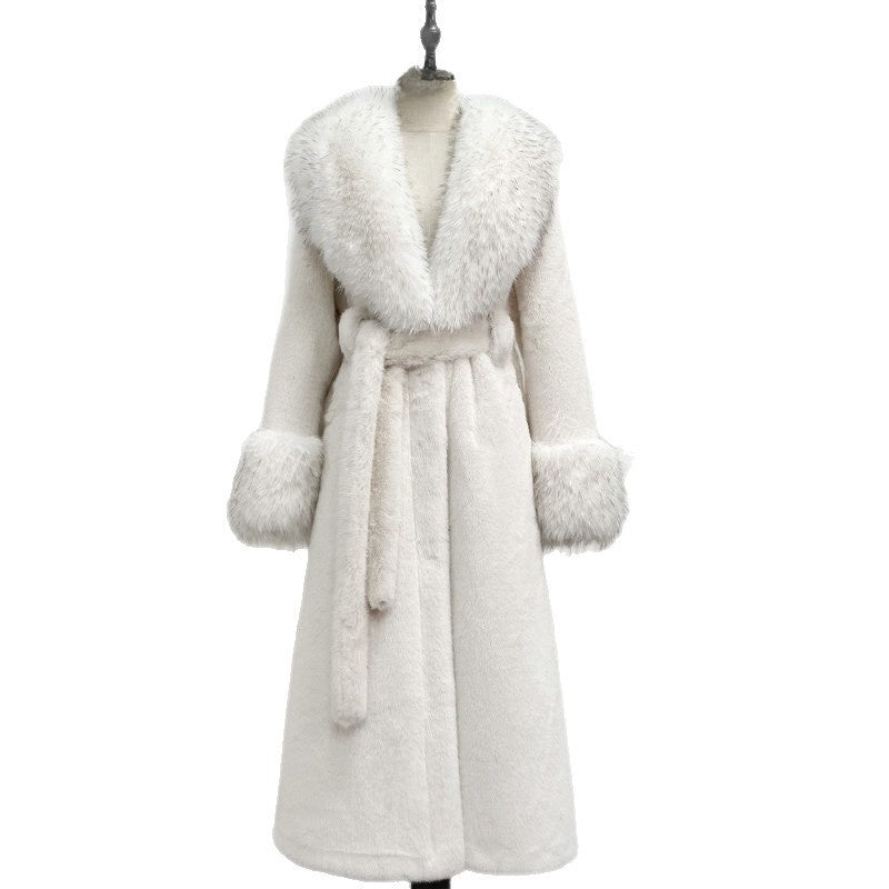 White long belted vegan fur coat with a wide fur collar, fur cuffs and a tie belt on a white background